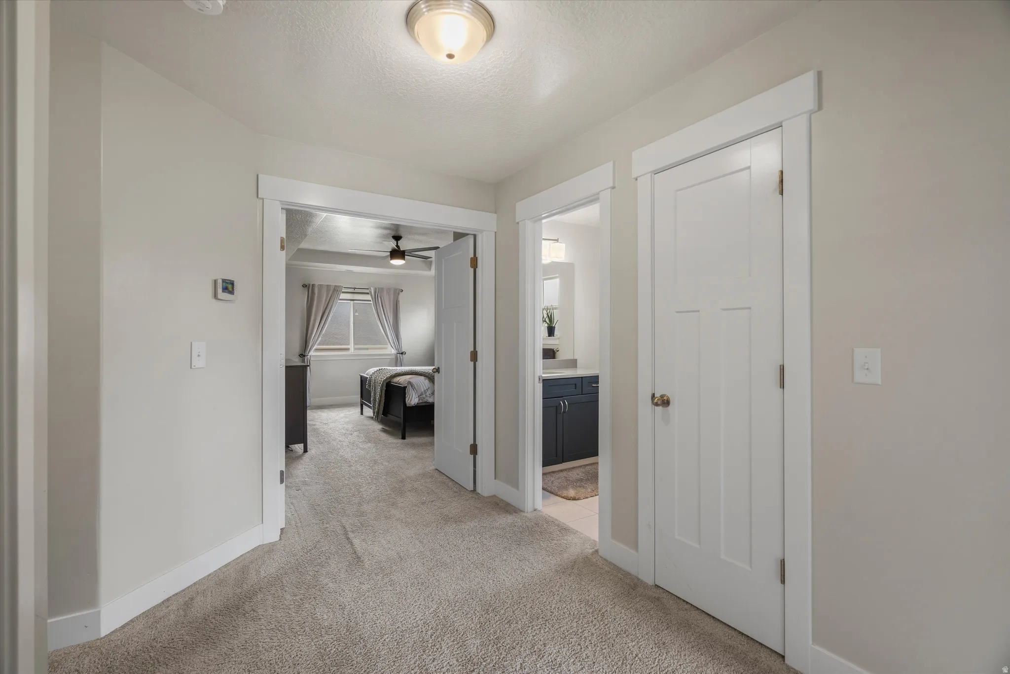 The primary suite is upstairs behind double doors
