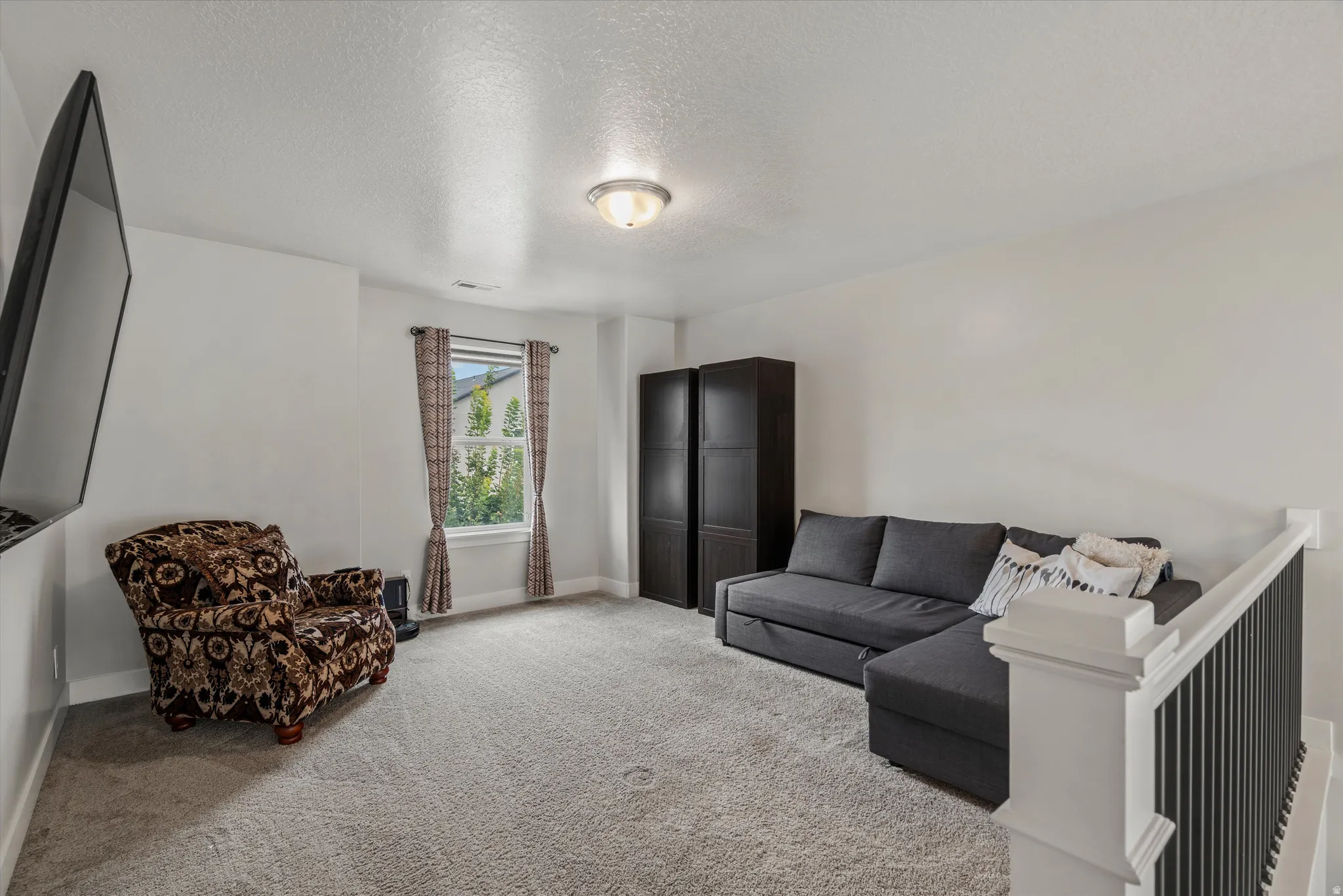 Another view of the loft.  West facing views from the window.