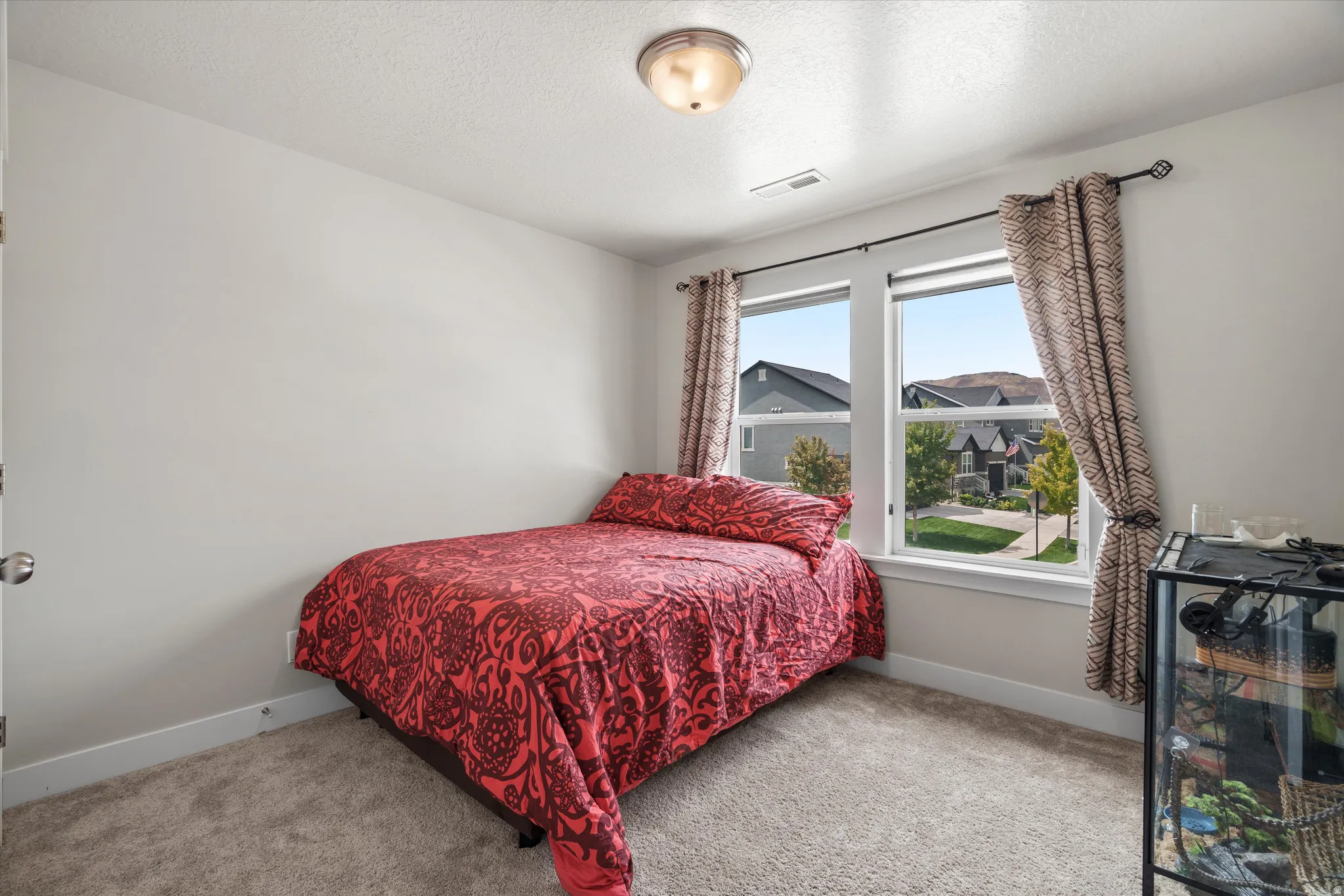 Guest bedroom #2 with west facing views - adjacent to guest bedroom #1.