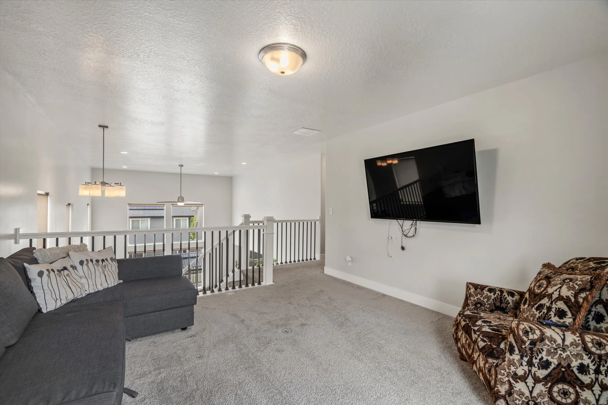 At the top of the stairs is a large loft offering a ton of versatility!