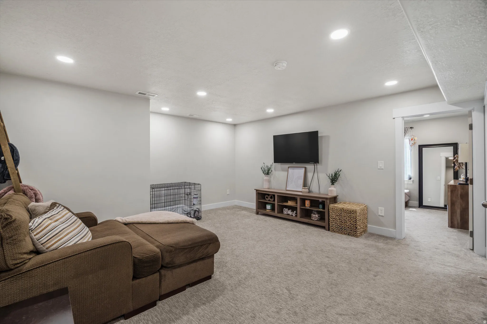 Another angle of the family room looking into guest bedroom #3 - located in the basement.