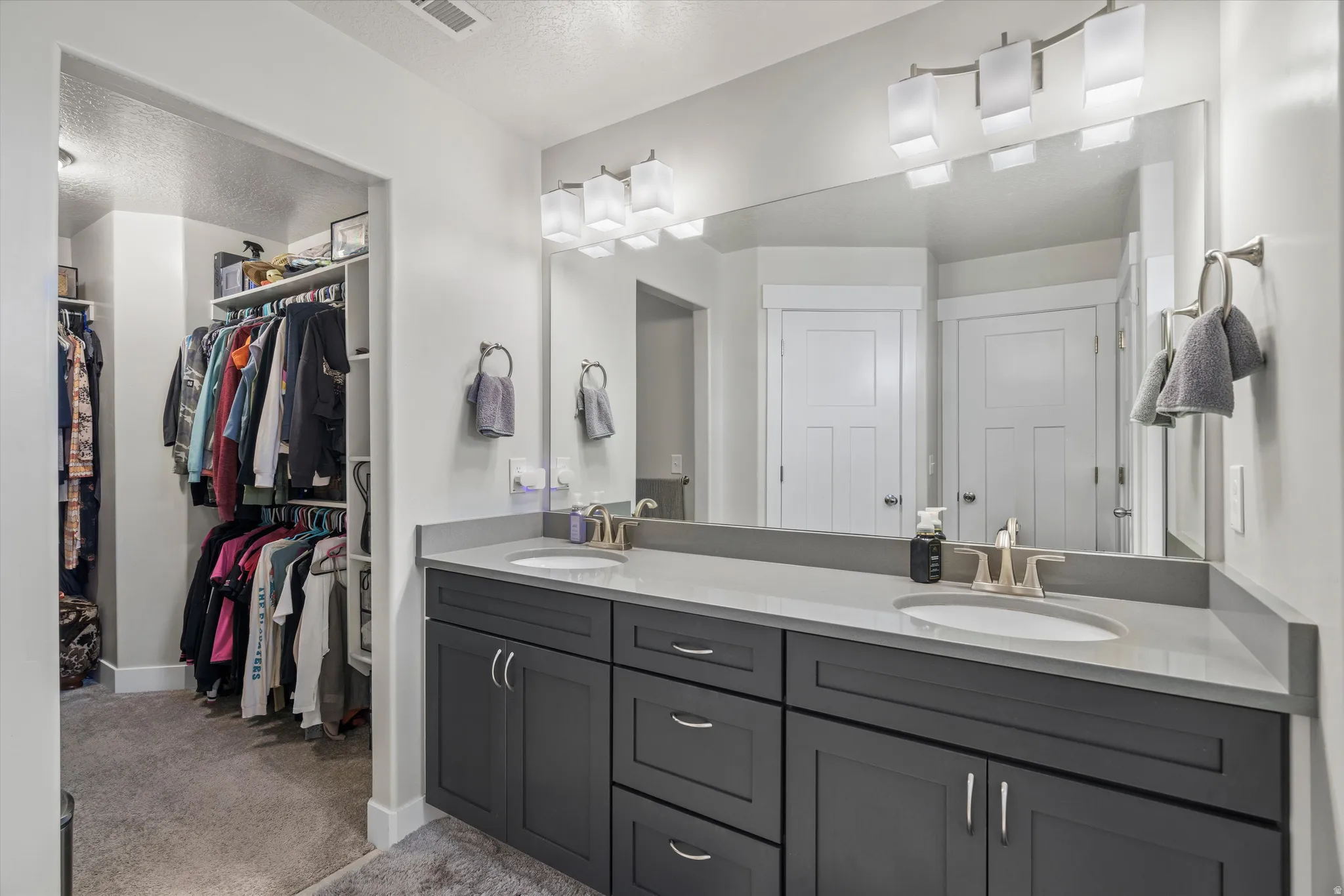 Huge walk-in-closet can be found in the primary suite.