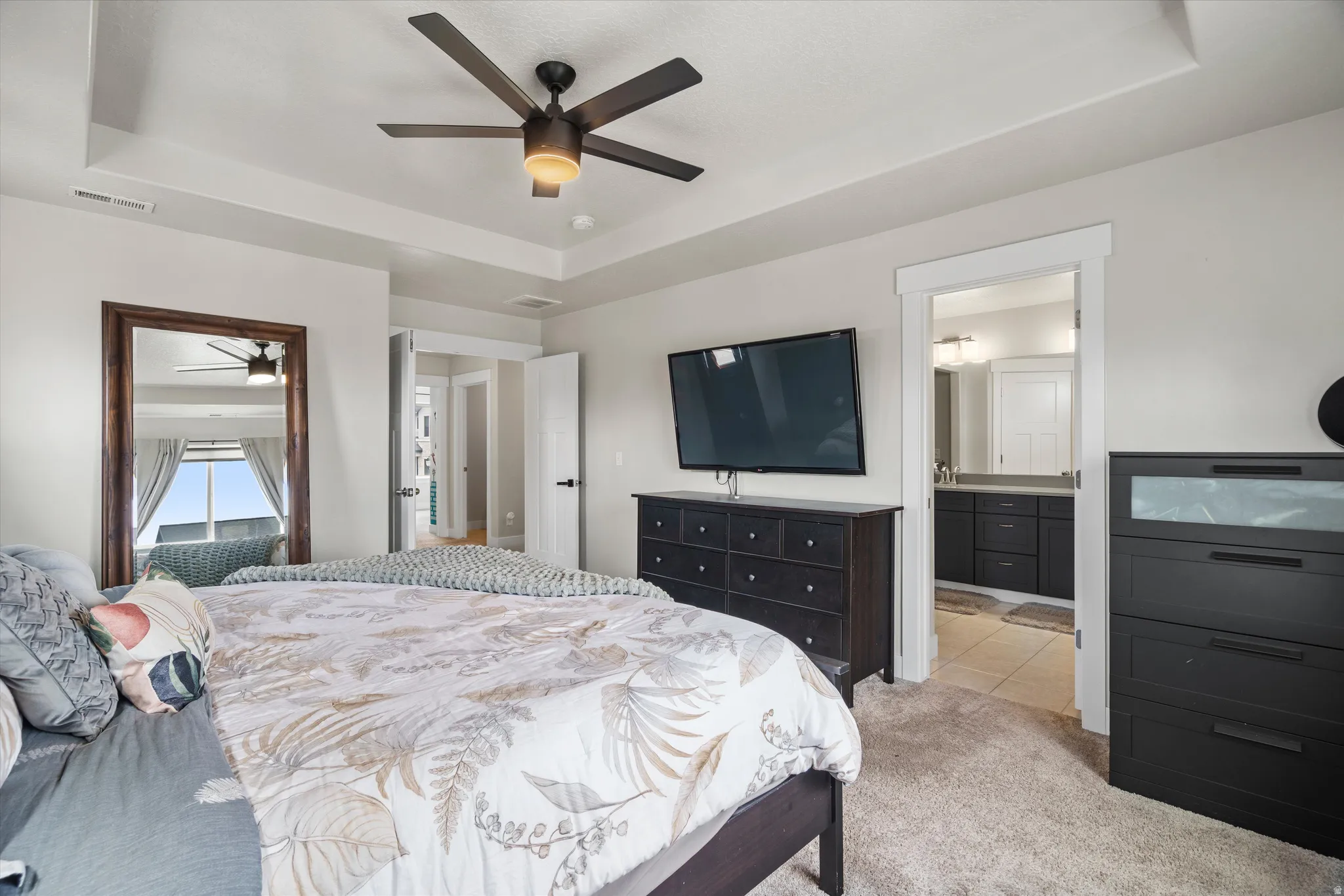 Primary bedroom is spacious in size with easterly views from the window.