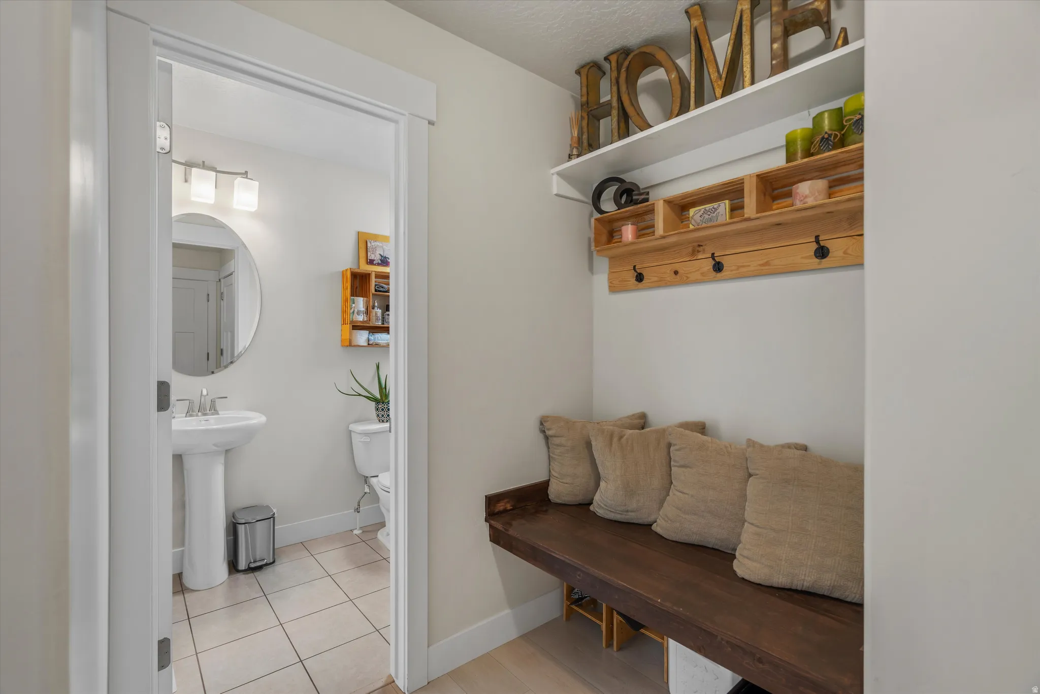 Mud room and half bath are off of the kitchen, and adjacent to the garage.