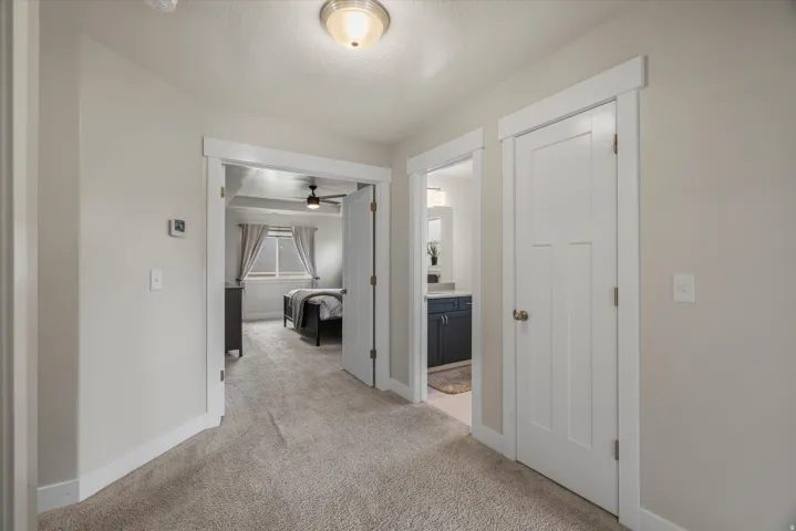 The primary suite is upstairs behind double doors
