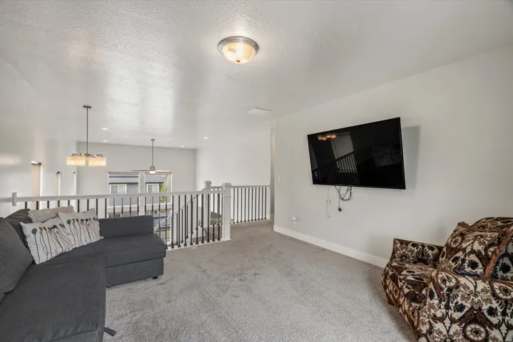At the top of the stairs is a large loft offering a ton of versatility!