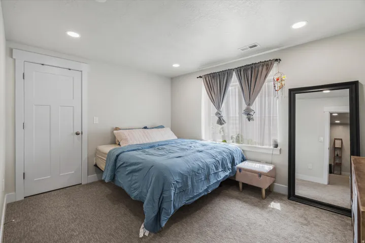 Guest bedroom #3 is located in the basement.
