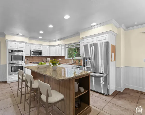 Virtual rendering of painted kitchen with added virtual staging