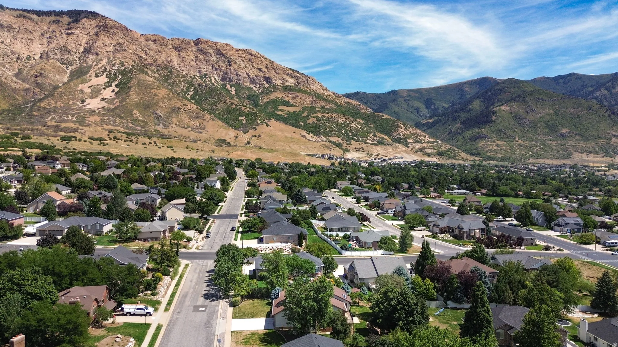 Aerial view of the home looking East with the Divide in the background.