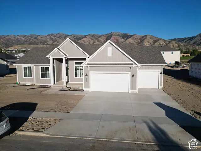 Contemporary gray siding exterior with white trim