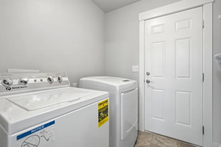 Laundry area  with INCLUDED SPEED QUEEN WASHER! AND DRYER
