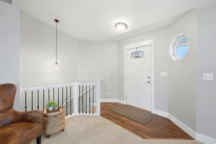 Entryway to living room or down to basement
