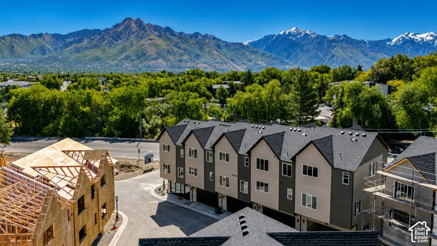 Newly constructed townhome community with pitched roofs