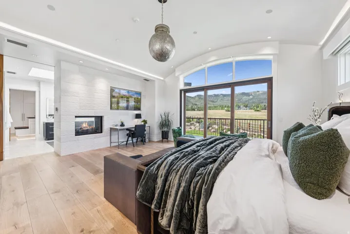 Light-toned wood-finish flooring throughout
