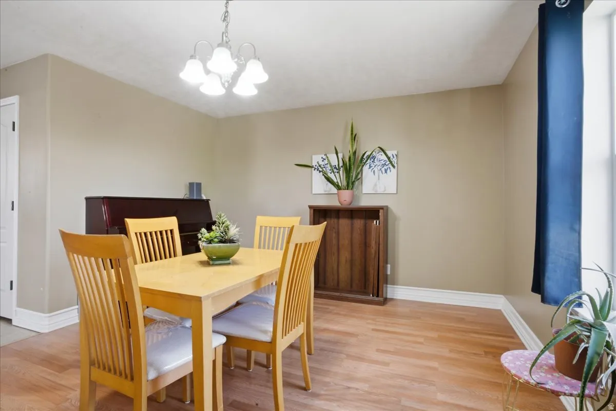 Wood-finish flooring with neutral wall tones and white trim