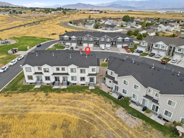 Townhome development featuring multiple units with a uniform exterior design