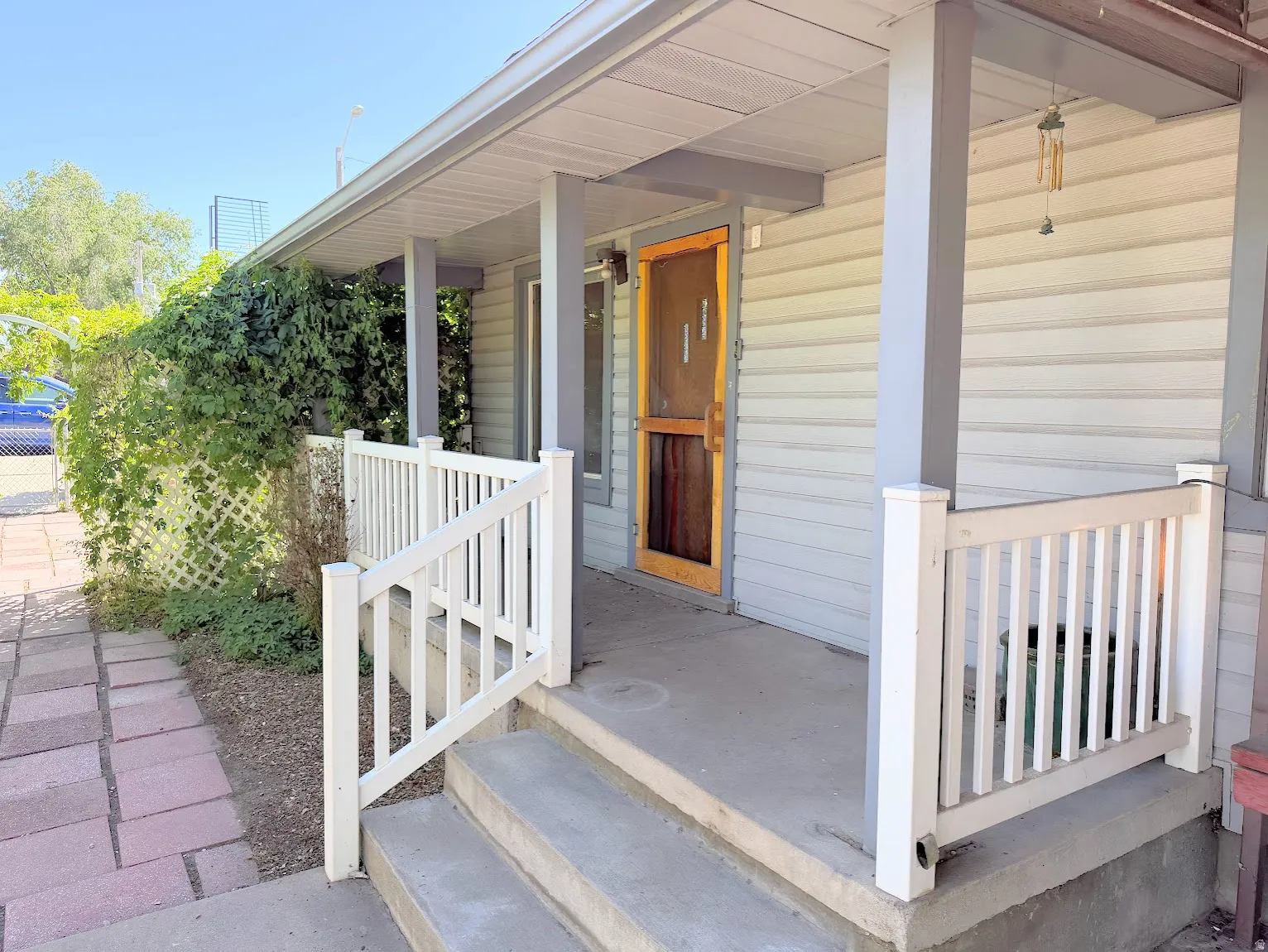Covered front porch. Main Level Front Door.