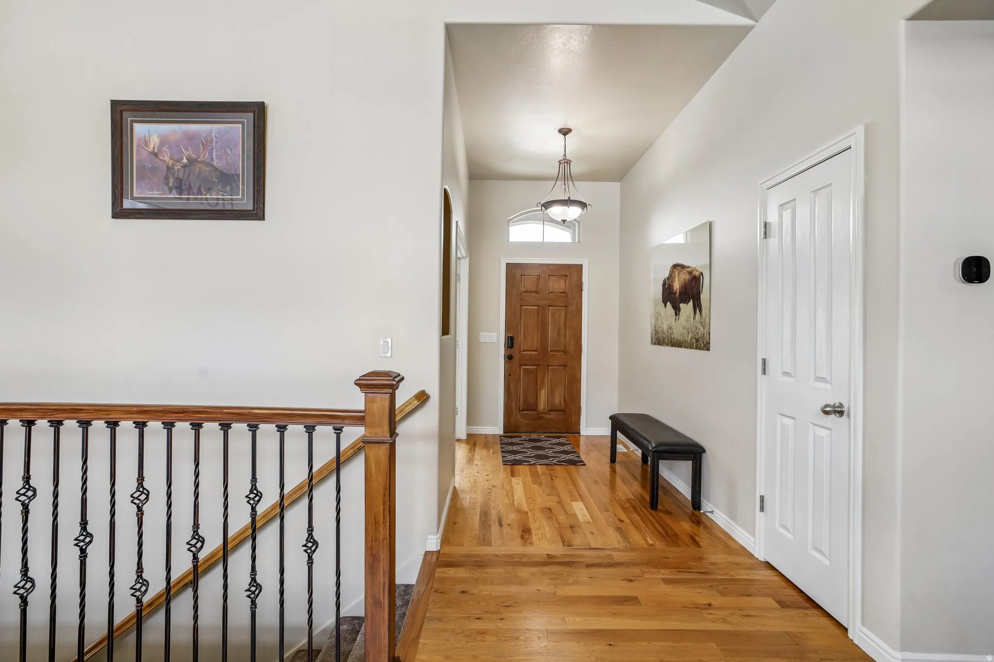 Wood-finish flooring throughout the entryway