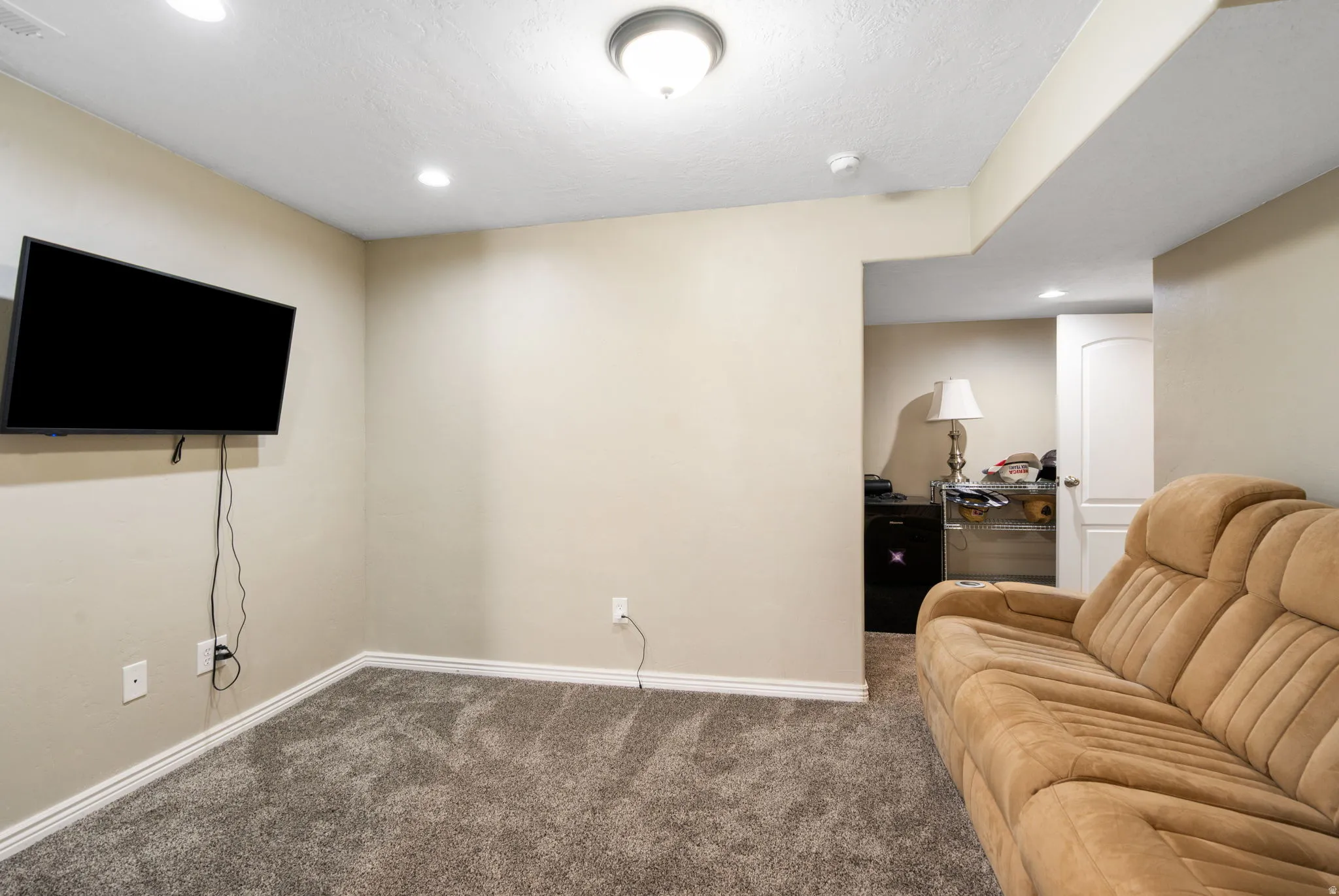 Recessed lighting, ceiling-mounted fixture, and carpeted flooring
