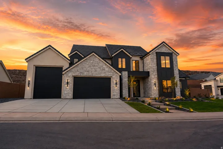 Modern-style exterior featuring stone and vertical siding accents