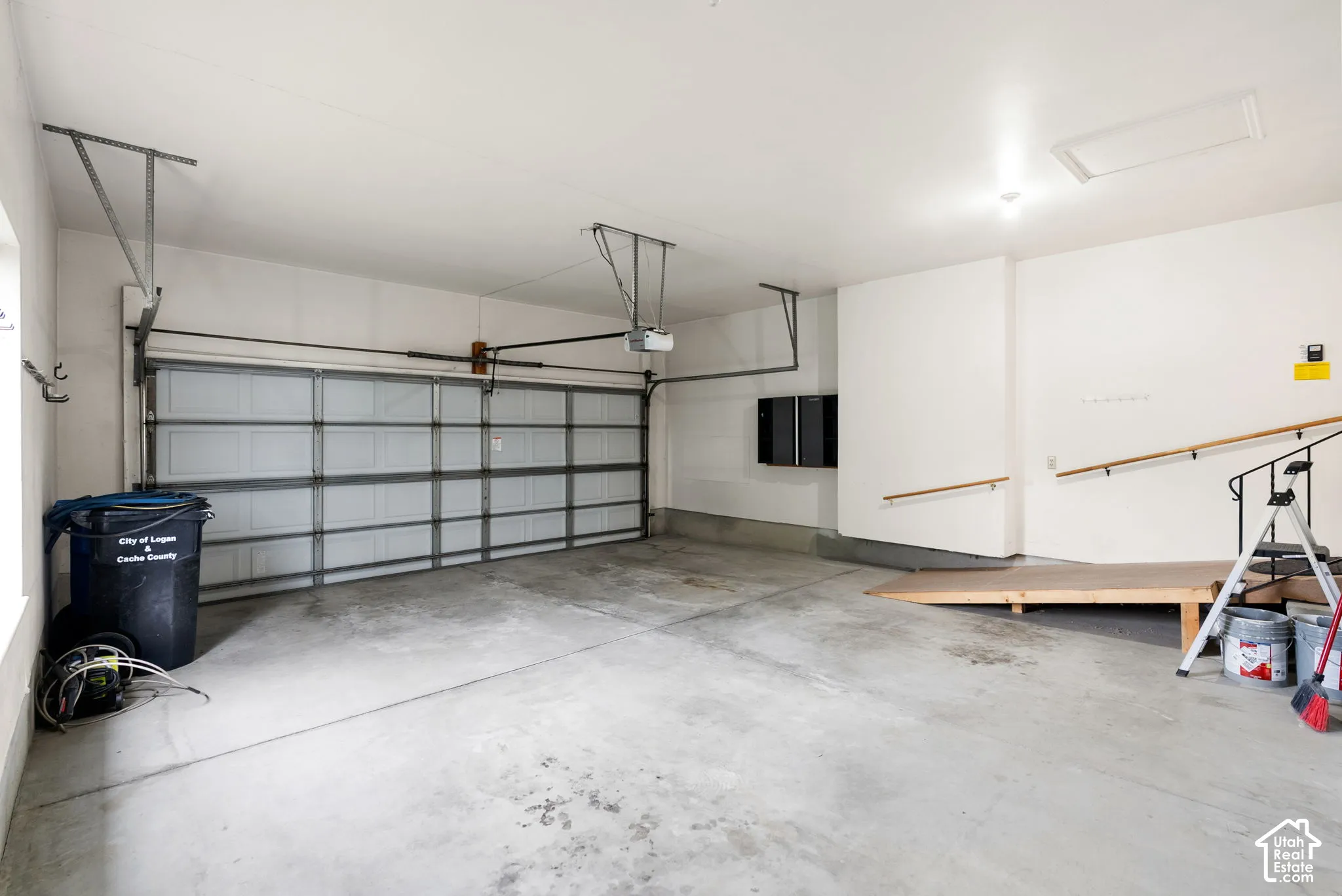 Attached garage with a sectional garage door