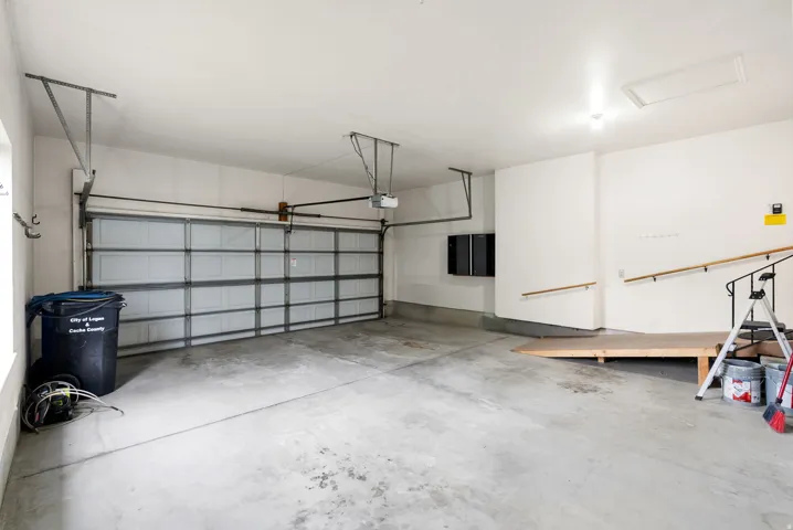 Attached garage with a sectional garage door