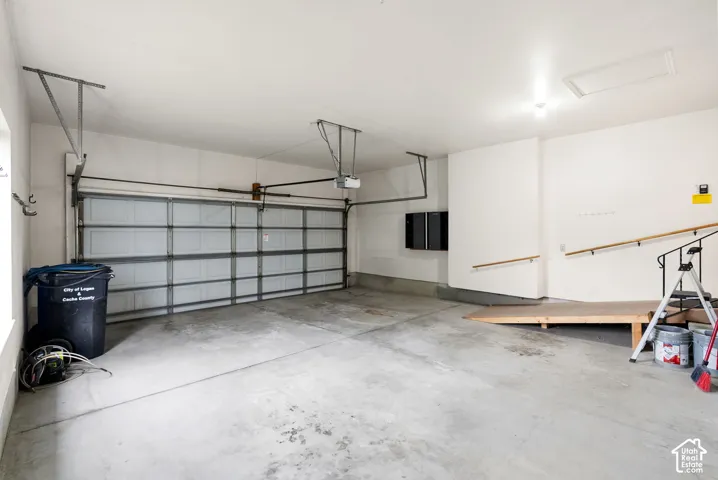 Attached garage with a sectional garage door
