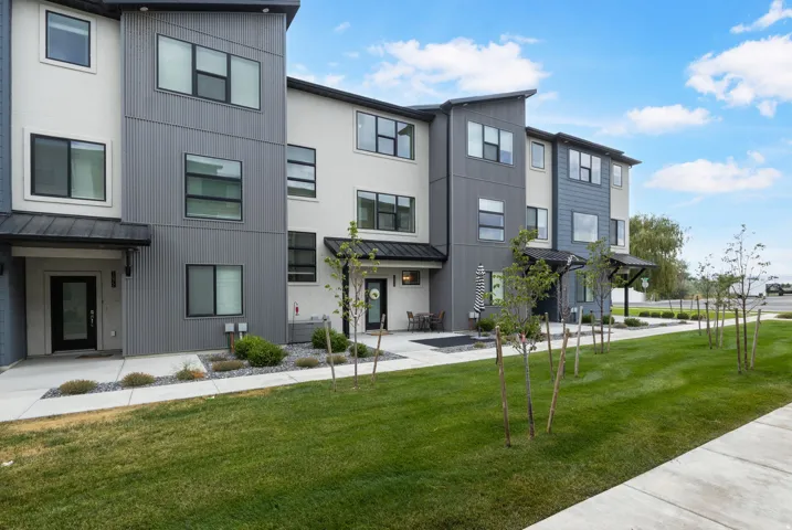 Contemporary multi-story exterior with varied siding