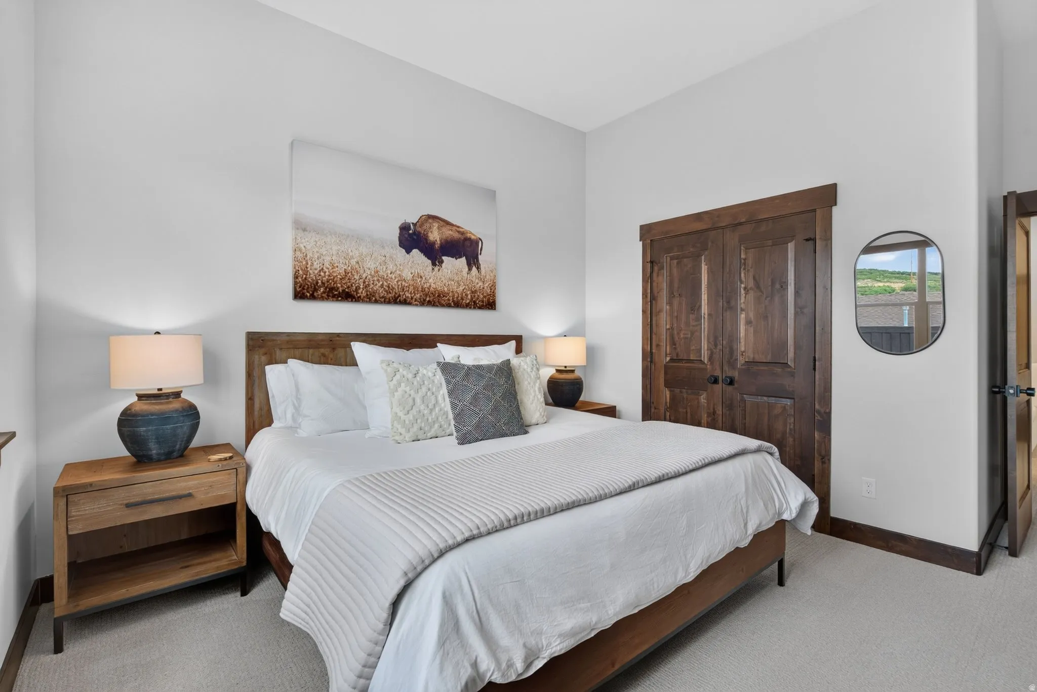 Neutral-toned walls complement wood-finish trim and doors
