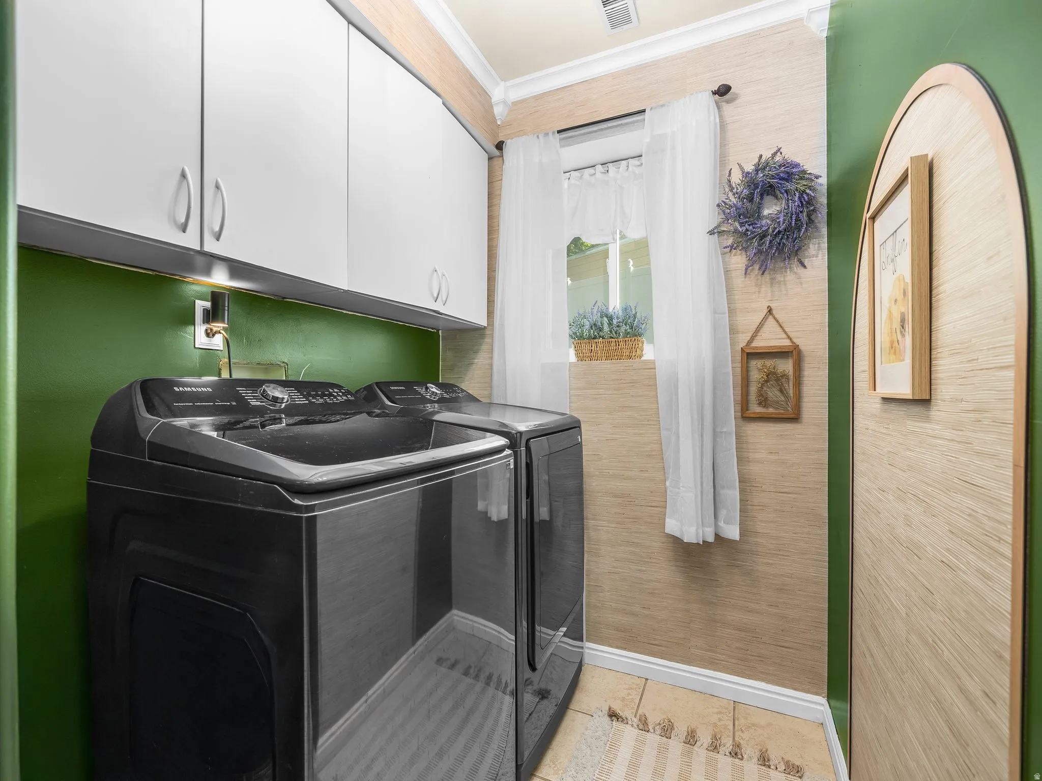 White upper cabinetry with under-cabinet lighting