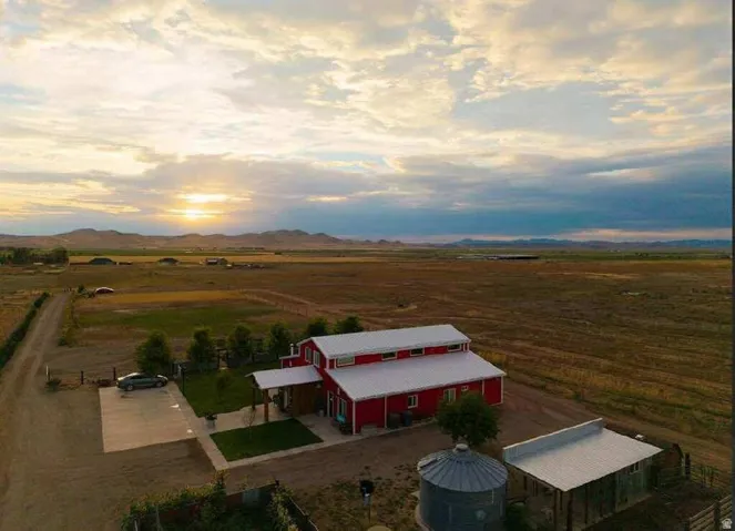 Red barn-style residence with white trim