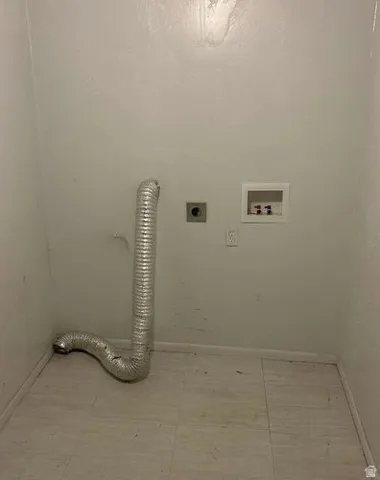 Laundry hookup in huge common area.