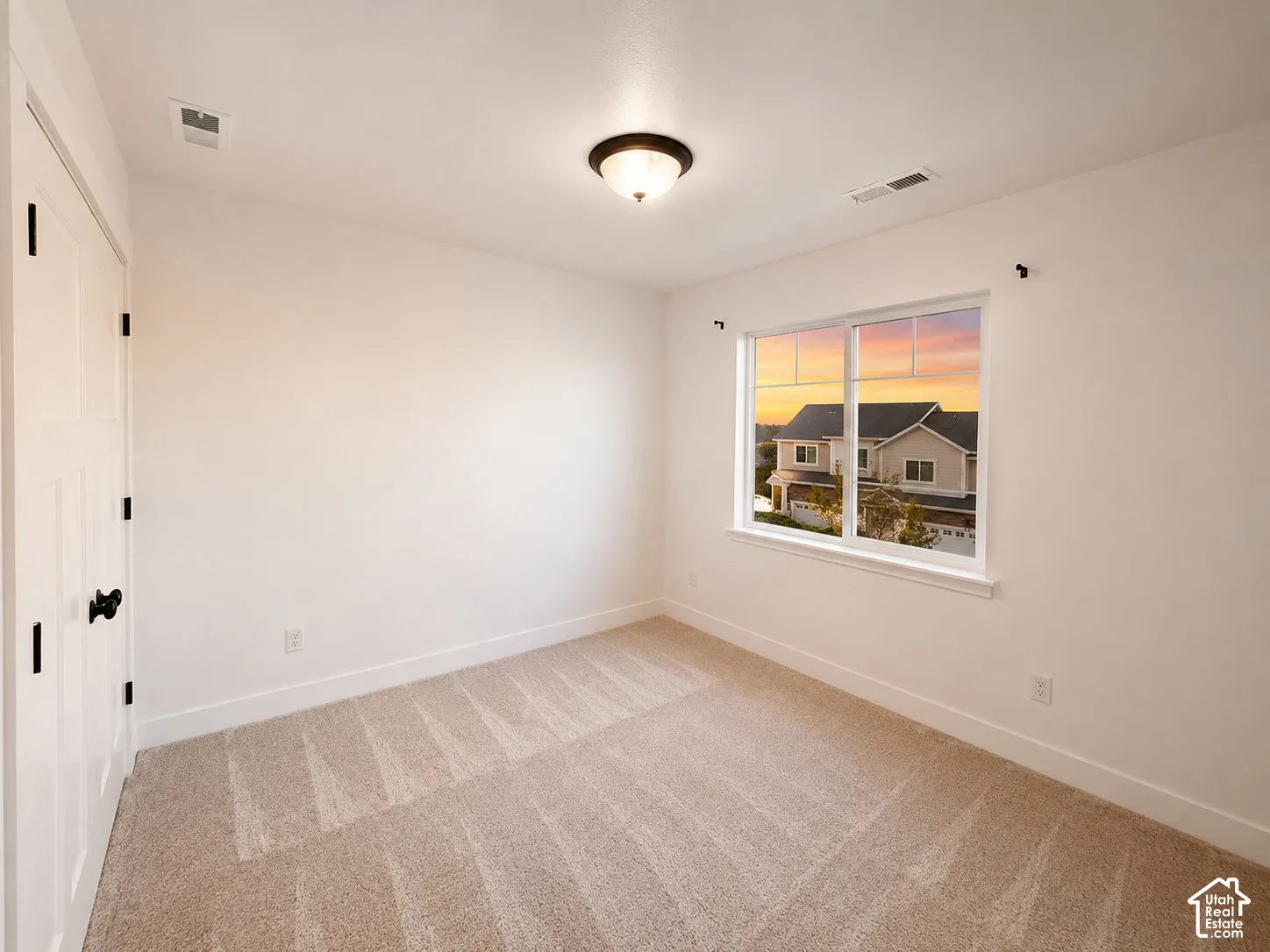 Light beige carpeting throughout