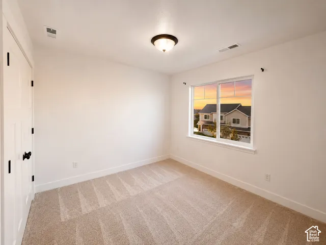 Light beige carpeting throughout