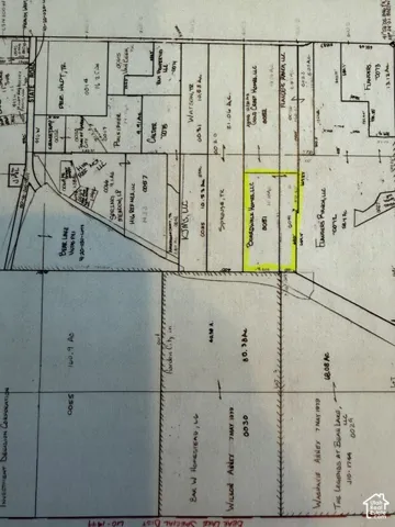 Plat Map. Illustrating property divisions and ownership details within a designated area