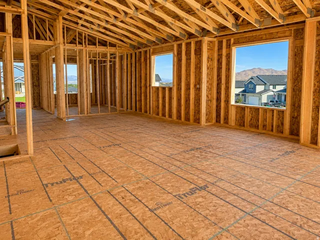Photo of actual home at framing stage. AI  has been used to clean up photos