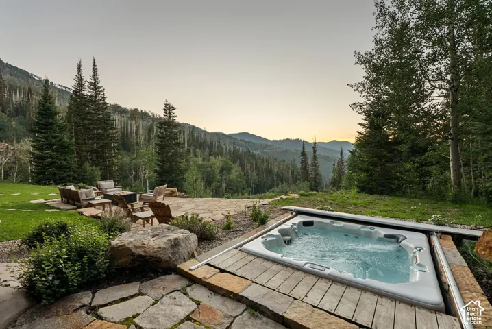 Outdoor hot tub set into wood decking