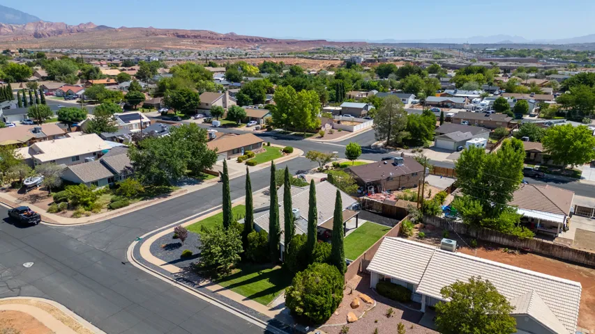 Established neighborhood with mature trees and paved streets