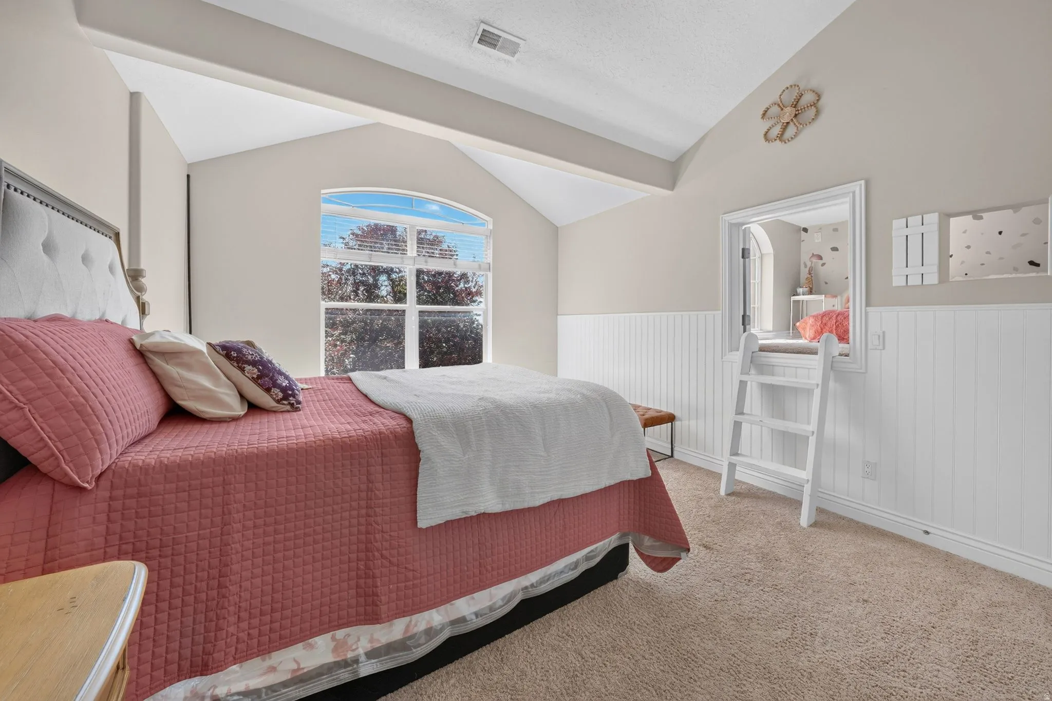 Arched window with gridded panes