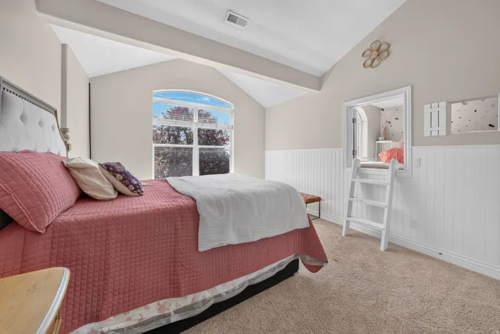 Arched window with gridded panes