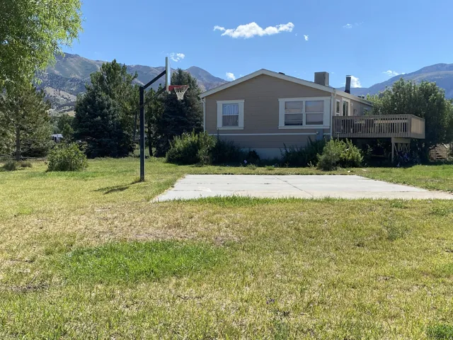 Back yard showing the basketball court.