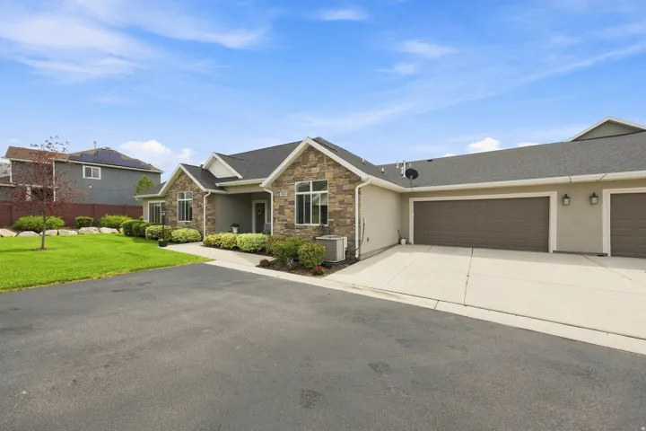 Stone accent exterior with stucco siding