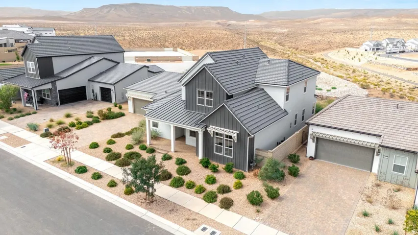 Modern architectural design with a tiled roof and board and batten siding