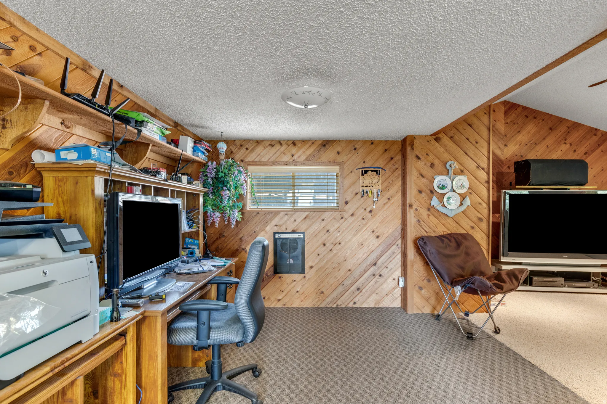 Wood-paneled walls and ceiling accents