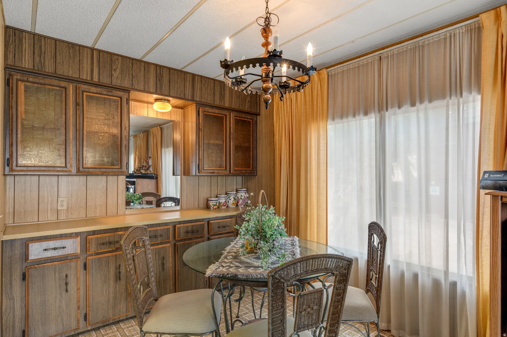 Wood-finish cabinetry and wall paneling