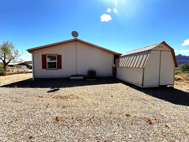 East side of lot. Detached shed with metal gambrel roof