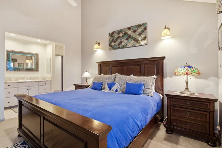 High ceilings, recessed lighting, and wall-mounted sconces