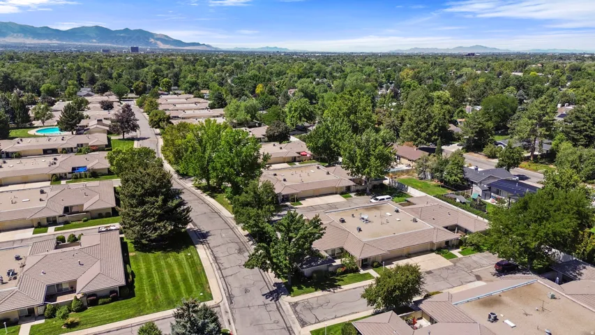 Community features a swimming pool and mature trees