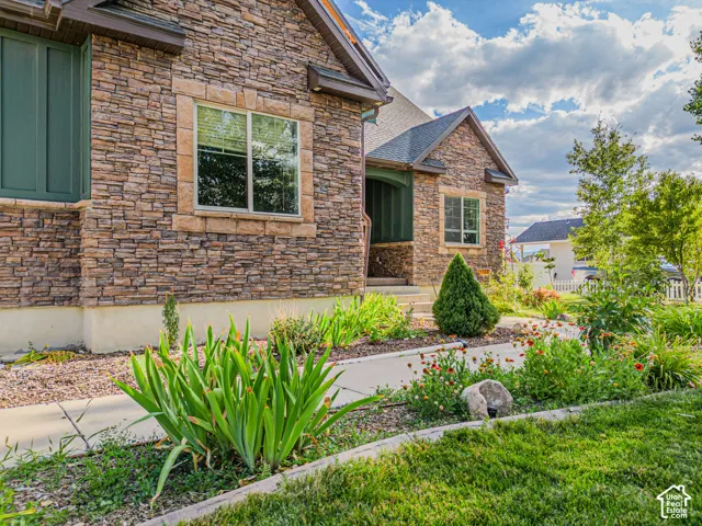Stone veneer exterior with contrasting trim