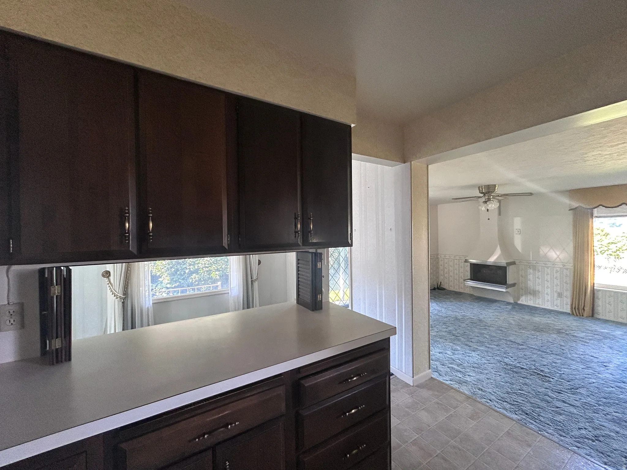 Kitchen leads to the family room for additional entertaining space